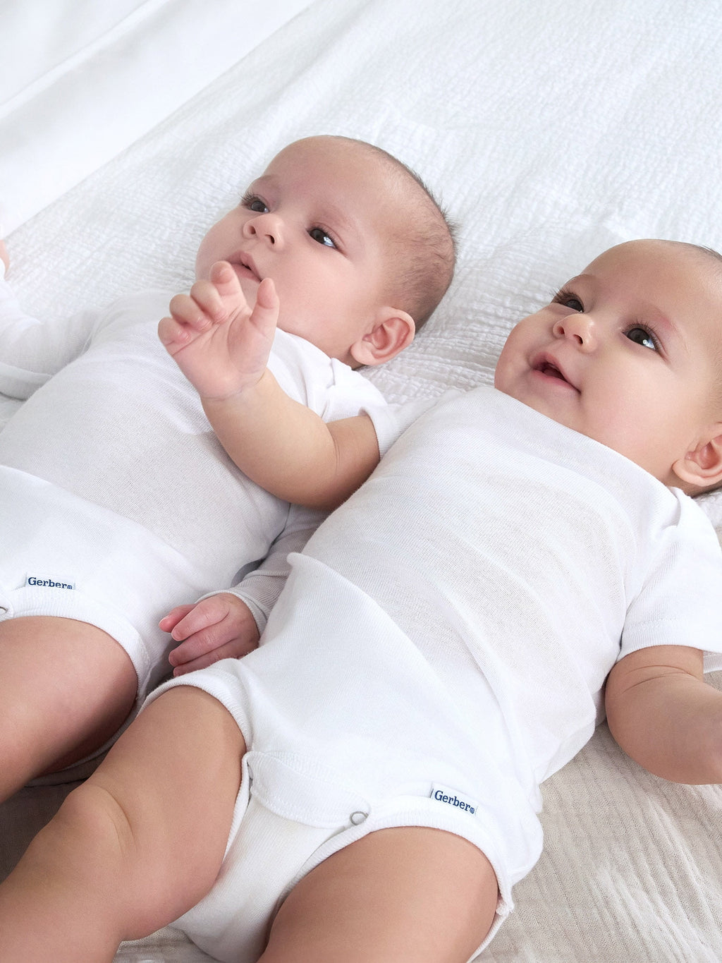 Gerber Gender Neutral Casual White Long Sleeve Cotton Bodysuit, 3-Pack, Sizes Preemie - 24 Months